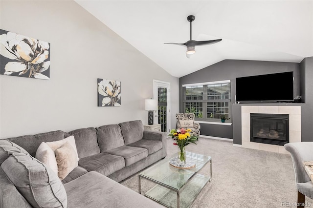 2955 Blue Sky Cir Unit 6-307, Erie, CO 80516 - carpeted living room featuring lofted ceiling, ceiling fan, and a tile fireplace