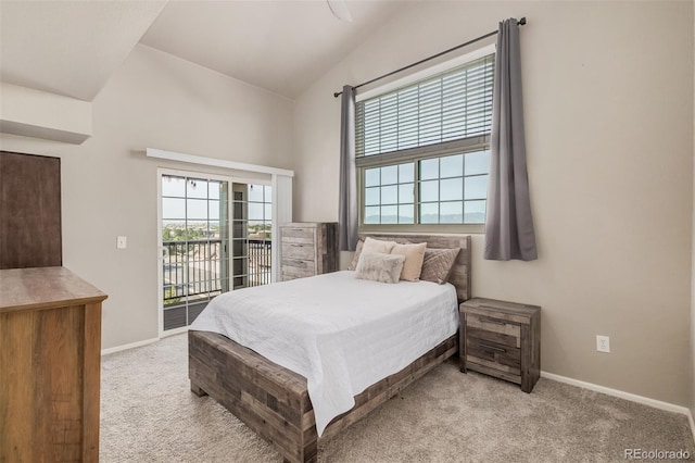 2955 Blue Sky Cir Unit 6-307, Erie, CO 80516 - bedroom with access to outside, vaulted ceiling, and light colored carpet