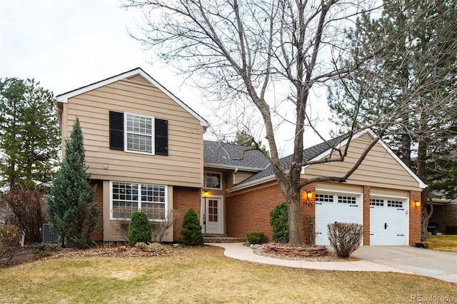 view of front facade featuring driveway, brick siding, a shingled roof, an attached garage, and a front yard