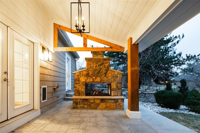 view of patio / terrace with an outdoor stone fireplace