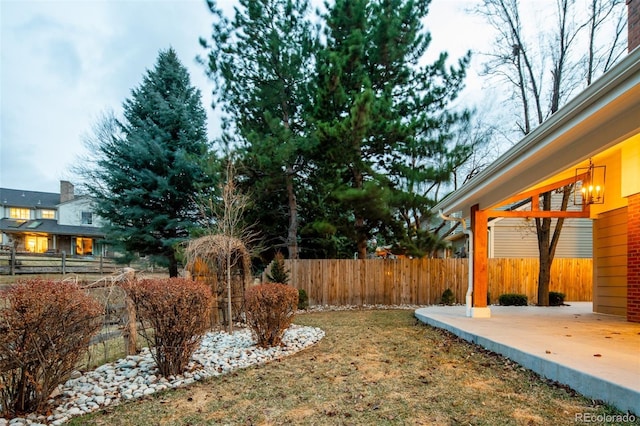 view of yard with a patio area and fence