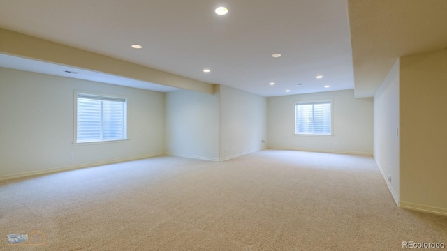 basement with light carpet