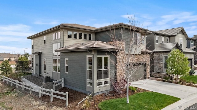 507 Red Thistle Dr, Highlands Ranch, CO 80126 - view of property exterior with an attached garage and driveway