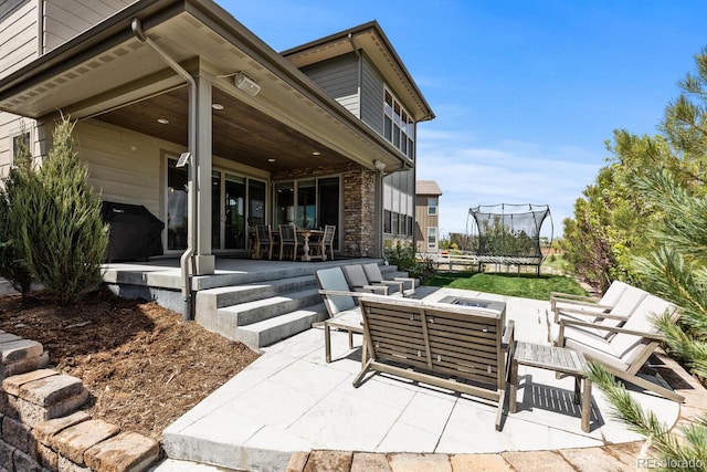 507 Red Thistle Dr, Highlands Ranch, CO 80126 - view of patio featuring a trampoline and an outdoor hangout area