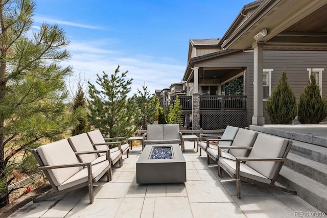 507 Red Thistle Dr, Highlands Ranch, CO 80126 - view of patio / terrace featuring an outdoor living space with a fire pit