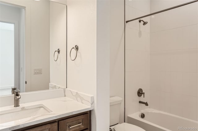 full bathroom with toilet, vanity, and bathtub / shower combination