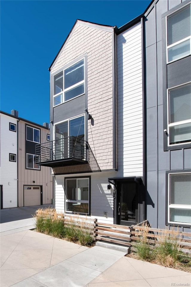 view of building exterior featuring a garage