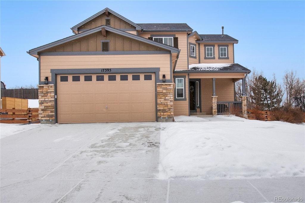 craftsman house featuring a garage and a porch