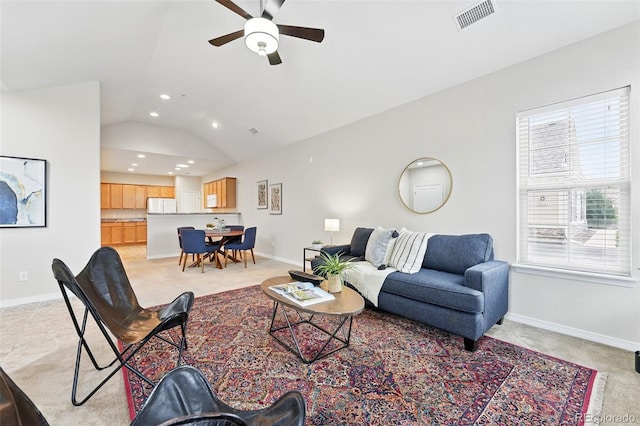 living area with visible vents, lofted ceiling, light carpet, ceiling fan, and recessed lighting