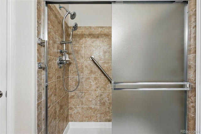 full bathroom featuring a shower stall