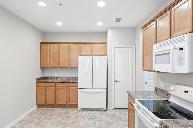 kitchen with visible vents, dark countertops, white appliances, baseboards, and recessed lighting