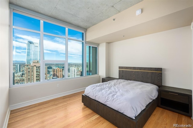 bedroom featuring light wood-type flooring