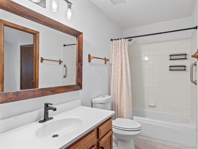 14 Aspen Dr, Bailey, CO 80421 - bathroom featuring vanity, toilet, and shower / bath combo with shower curtain