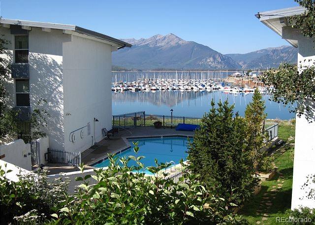 512 Tenderfoot St Unit 143, Dillon, CO 80435 - view of pool with a water and mountain view