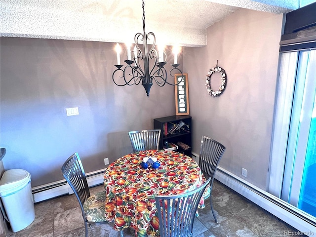 512 Tenderfoot St Unit 143, Dillon, CO 80435 - dining space featuring a chandelier, a baseboard radiator, a textured ceiling, and baseboards