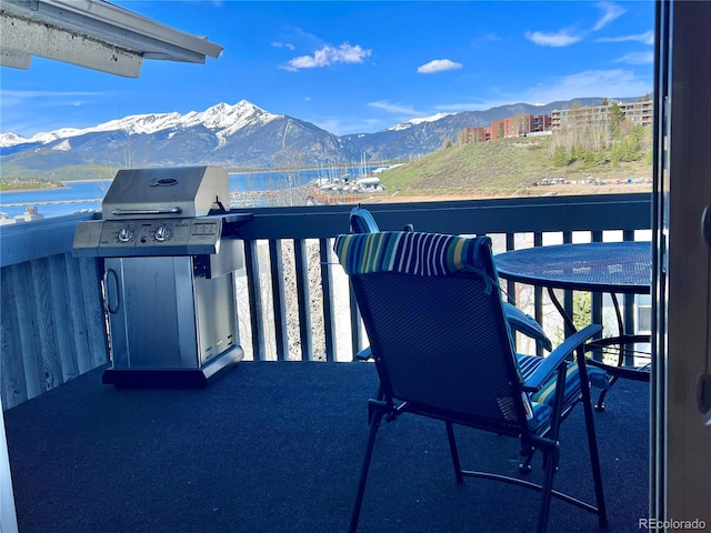 512 Tenderfoot St Unit 143, Dillon, CO 80435 - balcony with a grill and a water and mountain view