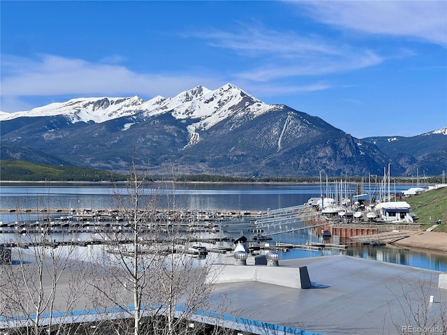 512 Tenderfoot St Unit 143, Dillon, CO 80435 - view of mountain backdrop with a nearby body of water