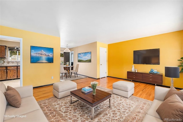 living room featuring light wood-style floors