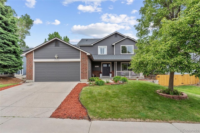 19935 E Stanford Dr, Centennial, CO 80015 - view of front facade featuring covered porch, an attached garage, concrete driveway, brick siding, and roof with shingles