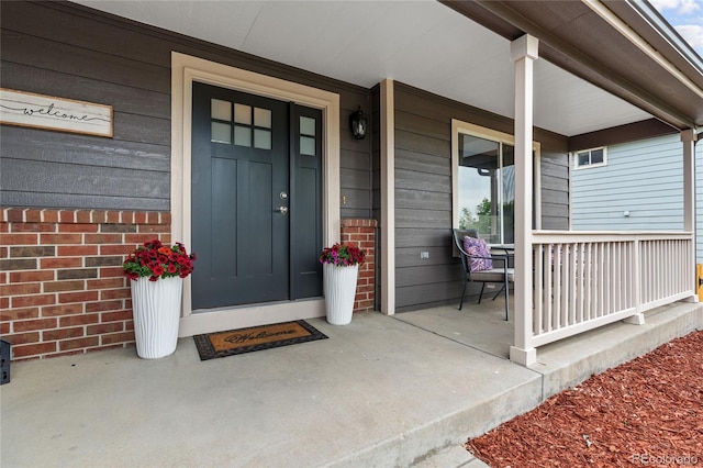 19935 E Stanford Dr, Centennial, CO 80015 - view of exterior entry featuring a porch