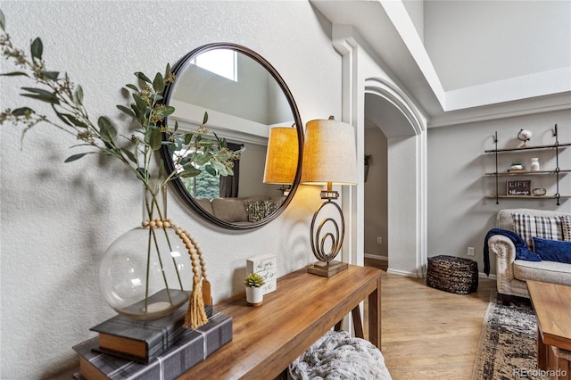 19935 E Stanford Dr, Centennial, CO 80015 - detailed view of wood finished floors, arched walkways, and baseboards