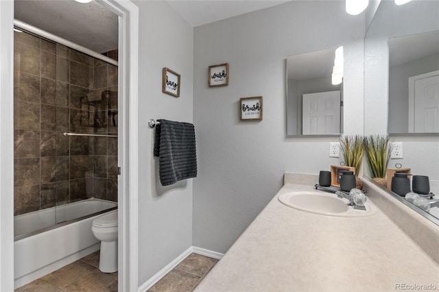 19935 E Stanford Dr, Centennial, CO 80015 - bathroom featuring toilet, vanity, enclosed tub / shower combo, baseboards, and tile patterned floors
