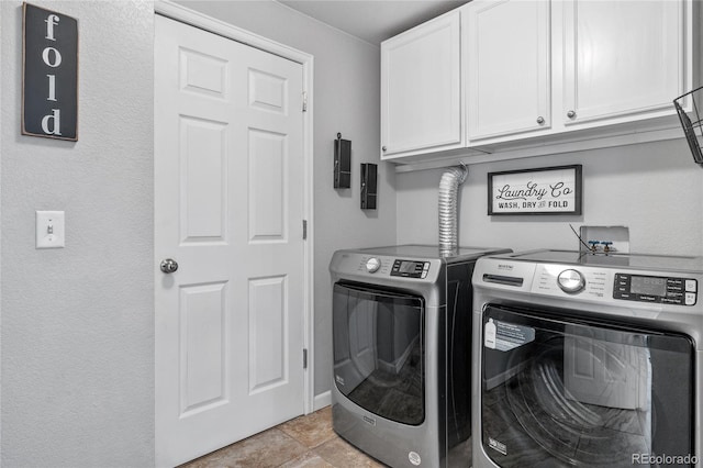 19935 E Stanford Dr, Centennial, CO 80015 - laundry room featuring cabinet space and washing machine and clothes dryer