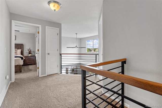 19935 E Stanford Dr, Centennial, CO 80015 - corridor with an upstairs landing, carpet flooring, and baseboards