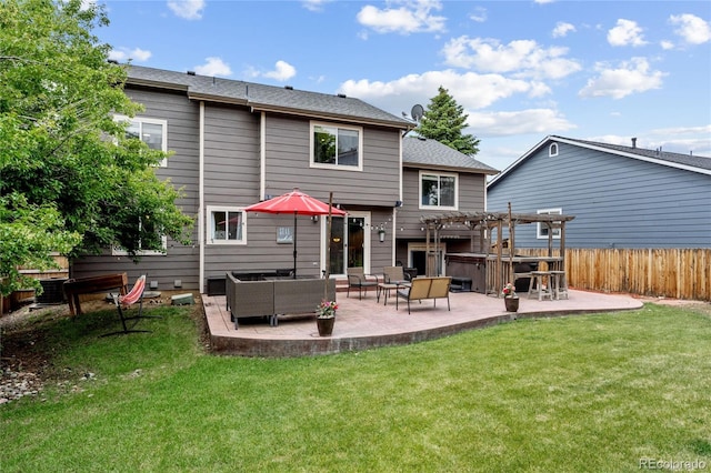 19935 E Stanford Dr, Centennial, CO 80015 - back of house with a pergola, a patio area, an outdoor hangout area, and roof with shingles