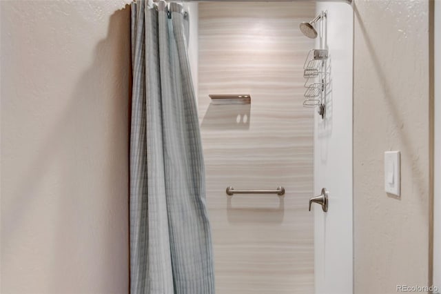 bathroom with walk in shower