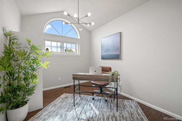 4882 W 68th Ave Unit 4, Westminster, CO 80030 - office space featuring vaulted ceiling, a chandelier, wood finished floors, and baseboards