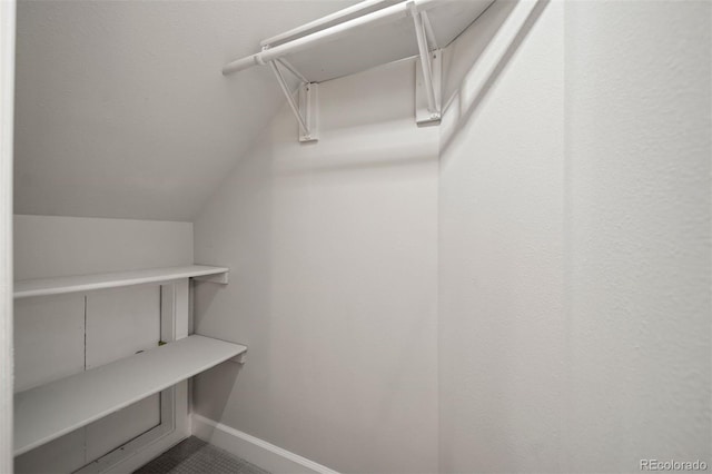 4882 W 68th Ave Unit 4, Westminster, CO 80030 - spacious closet featuring vaulted ceiling