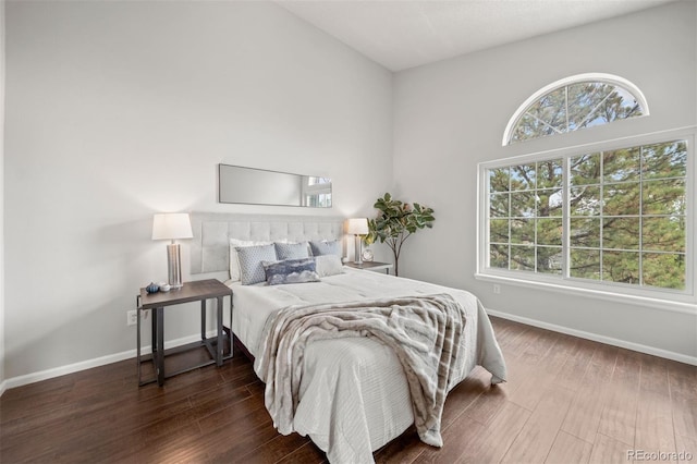 4882 W 68th Ave Unit 4, Westminster, CO 80030 - bedroom featuring wood finished floors and baseboards