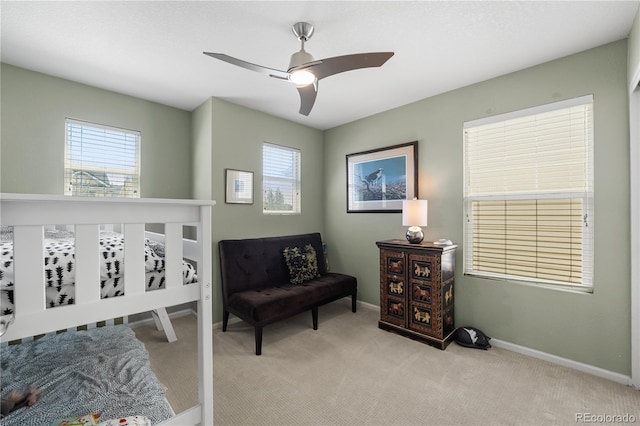 2846 Central Park Blvd, Denver, CO 80238 - sitting room featuring light colored carpet, plenty of natural light, and baseboards