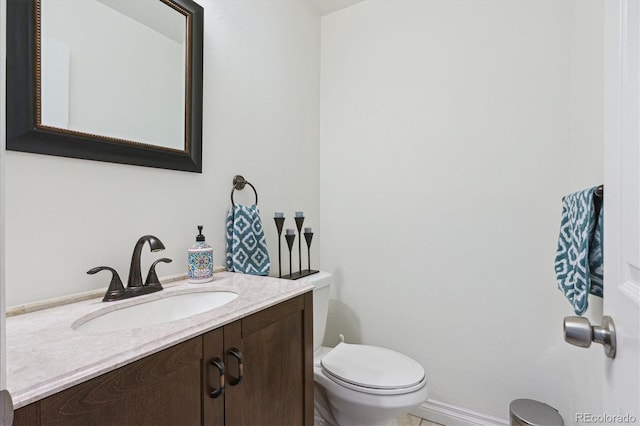 4750 S Dudley St Unit 21, Littleton, CO 80123 - bathroom featuring toilet and vanity