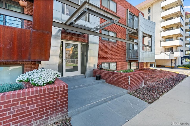 75 N Emerson St Unit 206, Denver, CO 80218 - view of exterior entry with brick siding