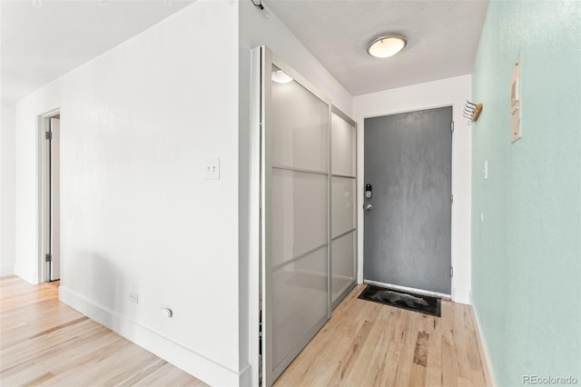 75 N Emerson St Unit 206, Denver, CO 80218 - hall with wood finished floors and baseboards