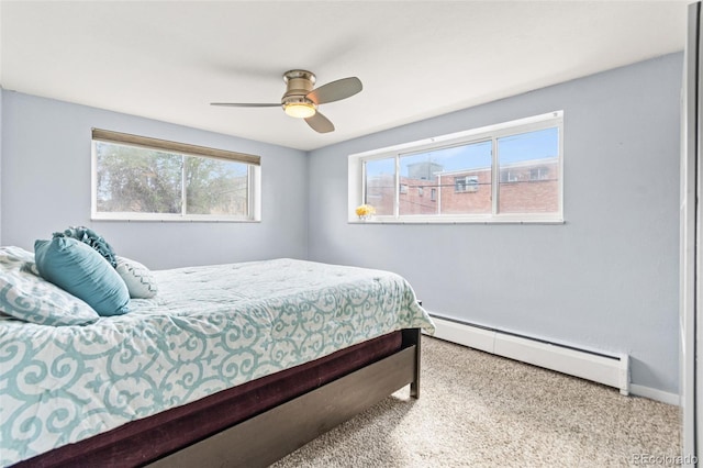 75 N Emerson St Unit 206, Denver, CO 80218 - carpeted bedroom with baseboard heating, multiple windows, baseboards, and ceiling fan