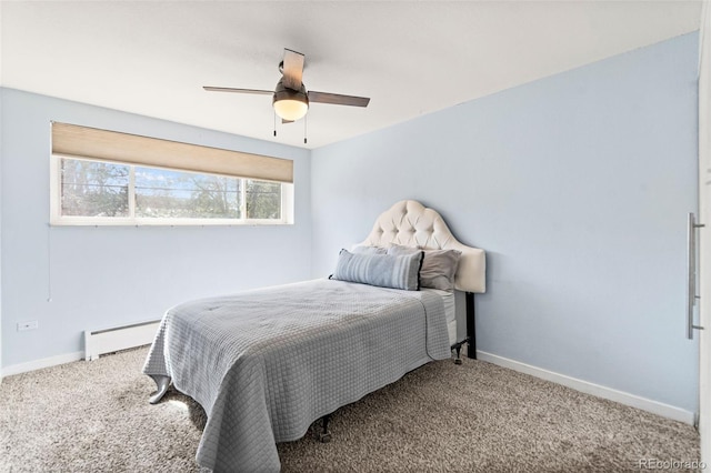 75 N Emerson St Unit 206, Denver, CO 80218 - carpeted bedroom with a baseboard heating unit, baseboards, and ceiling fan