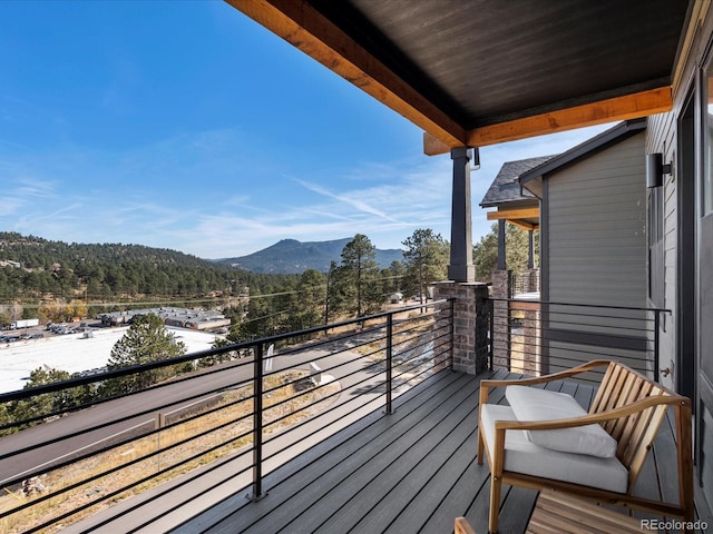 balcony featuring a mountain view