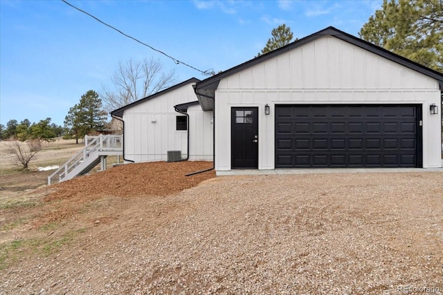 11840 Elkhorn Dr, Franktown, CO 80116 - modern farmhouse featuring board and batten siding, stairs, and a garage
