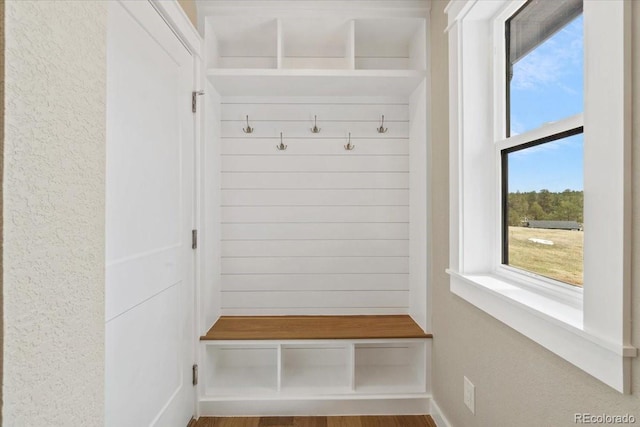 11840 Elkhorn Dr, Franktown, CO 80116 - mudroom featuring a textured wall