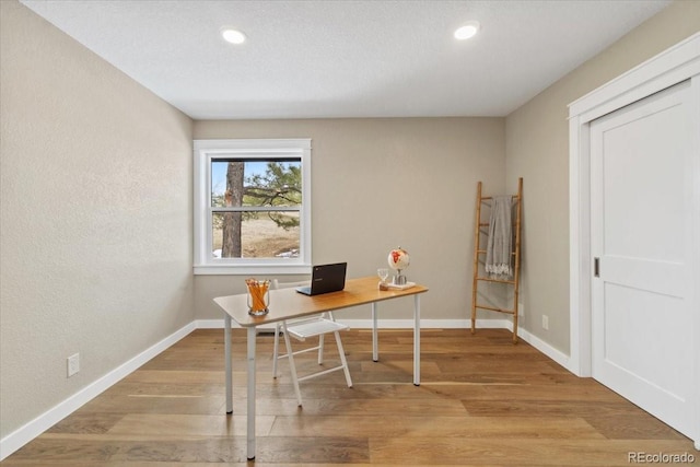 11840 Elkhorn Dr, Franktown, CO 80116 - office space with wood finished floors, baseboards, and recessed lighting