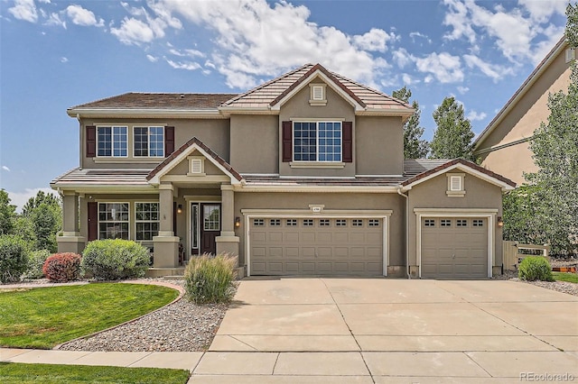 view of front of home with a garage