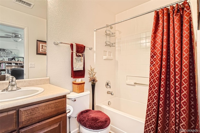 full bathroom with vanity, toilet, shower / bath combination with curtain, and ceiling fan