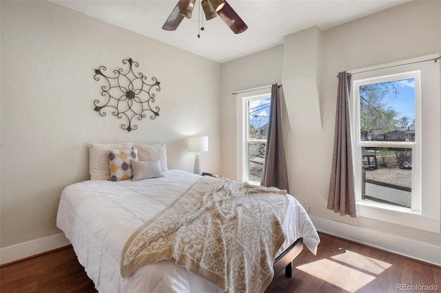 112 S Limit St, Colorado Springs, CO 80905 - bedroom featuring ceiling fan, baseboards, and wood finished floors