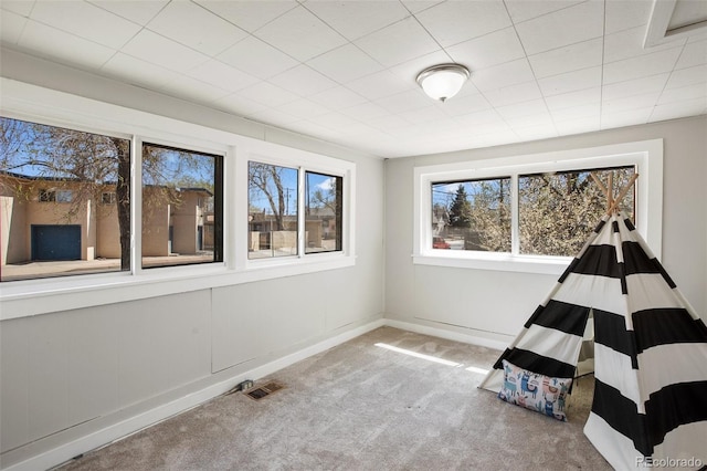 112 S Limit St, Colorado Springs, CO 80905 - rec room featuring carpet flooring, baseboards, and visible vents