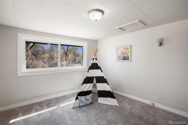112 S Limit St, Colorado Springs, CO 80905 - game room with attic access, carpet flooring, and baseboards