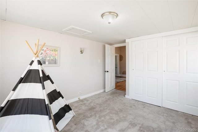 112 S Limit St, Colorado Springs, CO 80905 - unfurnished bedroom with baseboards, carpet flooring, a closet, and attic access