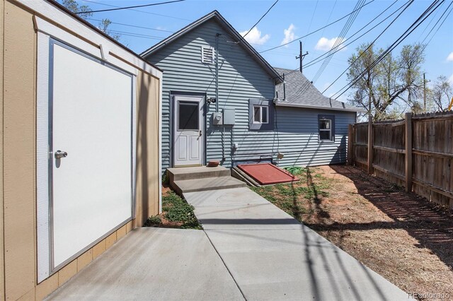 112 S Limit St, Colorado Springs, CO 80905 - back of property with fence and roof with shingles